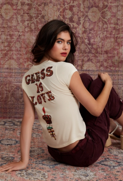 Female model with Guess top