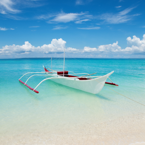 Tropical beach with boat